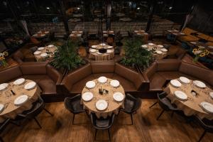 an overhead view of a restaurant with tables and chairs at Adella Boutique Hotel - Free Secured Parking in Sofia