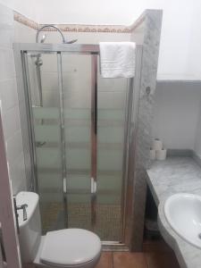 A bathroom at Santa Barbara by Placida Mar