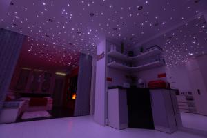 Postel nebo postele na pokoji v ubytování Flame Luxus Apartman