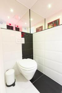 Koupelna v ubytování Flame Luxus Apartman
