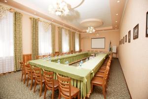 a large meeting room with a long table and chairs at Hotel Asia Khiva in Khiva +45 photos