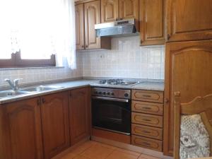 Kuchyň nebo kuchyňský kout v ubytování Apartmani Milena + 11 fotografií