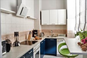 مطبخ أو مطبخ صغير في Apartament Chmielna BIS