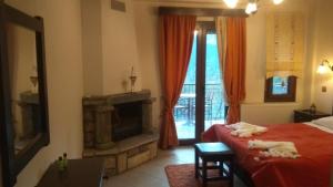 Postel nebo postele na pokoji v ubytování Evilion Traditional Inn