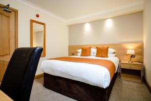 Postel nebo postele na pokoji v ubytování Victoria Hotel