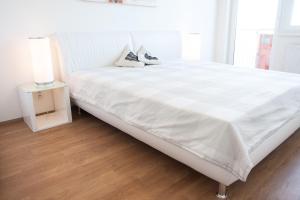 Posteľ alebo postele v izbe v ubytovaní Prostorný 3 pokojový apartmán s dvěma terasami