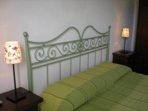 A bed or beds in a room at Villa Pina