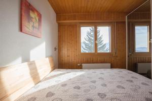 Postel nebo postele na pokoji v ubytování Immeuble Horizon