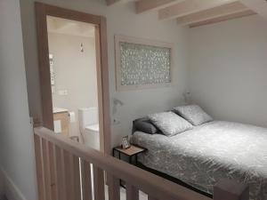 Ein Bett oder Betten in einem Zimmer der Unterkunft Picos de Europa Chic & Cool Apartments