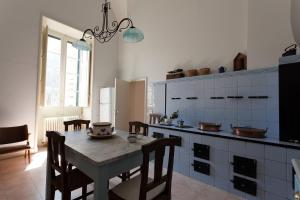 Kuchyňa alebo kuchynka v ubytovaní Palazzo Pio Apartment