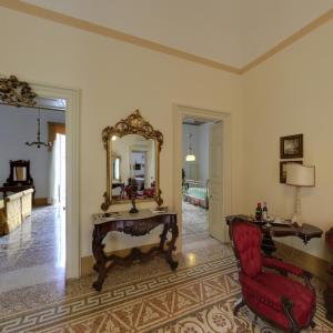 Posedenie v ubytovaní Palazzo Pio Apartment