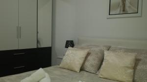 Postel nebo postele na pokoji v ubytování APARTMENT "Patricia"