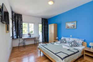 Postel nebo postele na pokoji v ubytování Villa Brasina + 37 fotografií