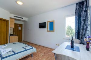 Postel nebo postele na pokoji v ubytování Villa Brasina