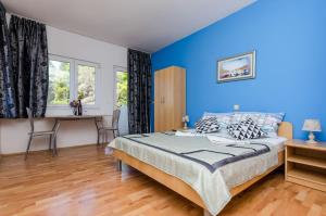 Postel nebo postele na pokoji v ubytování Villa Brasina