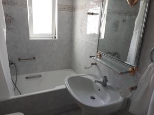 A bathroom at Sea view,big and comfortable appartment in Voula