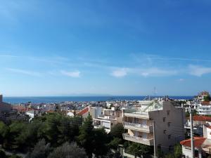 Photo de la galerie de l'établissement Sea view,big and comfortable appartment in Voula, à Athènes