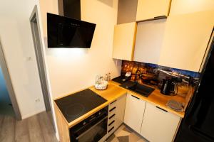 Kuchyňa alebo kuchynka v ubytovaní Apartament przy Wyspie Młyńskiej