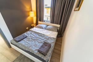 Posteľ alebo postele v izbe v ubytovaní Apartament przy Wyspie Młyńskiej