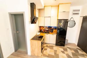 Kuchyňa alebo kuchynka v ubytovaní Apartament przy Wyspie Młyńskiej