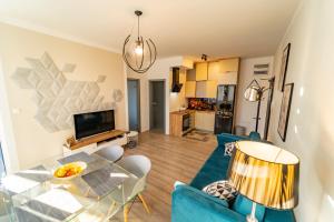 Kuchyňa alebo kuchynka v ubytovaní Apartament przy Wyspie Młyńskiej