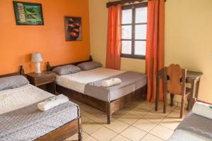 Ліжко або ліжка в номері Berakah B&B- Central Park