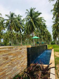 Bazén v ubytování Khao Lak Golden Coconut nebo v jeho okolí