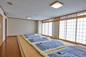 Kamogawa Country Hotel客房内的一张或多张床位