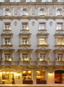 a large white building with many windows at Grand Brizo Bel Air in Buenos Aires