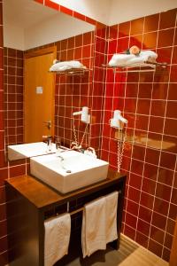 Phòng tắm tại Hotel Vila Luena