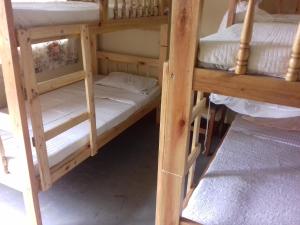 a couple of bunk beds sitting in a room at Kabale Back Packers in Kabale