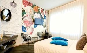 Postel nebo postele na pokoji v ubytování 15 Quindici by Serendipity Rooms