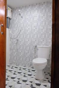 Ein Badezimmer in der Unterkunft Tangmo House