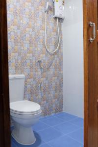 Ein Badezimmer in der Unterkunft Tangmo House
