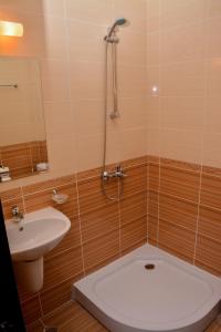 A bathroom at OLYMP Apart-Complex