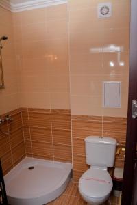 A bathroom at OLYMP Apart-Complex