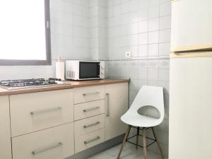 Kuchyň nebo kuchyňský kout v ubytování VERO Granada y PARKING en el edificio