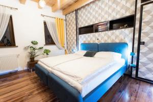 Postel nebo postele na pokoji v ubytování Kopec 67