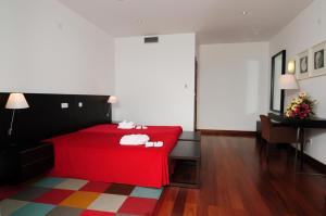 Uma cama ou camas num quarto em INATEL Vila Ruiva