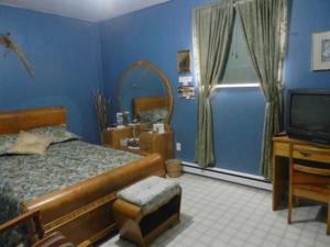 Un ou plusieurs lits dans un hébergement de l'établissement Domaine Joseph Ross Bed and Breakfast