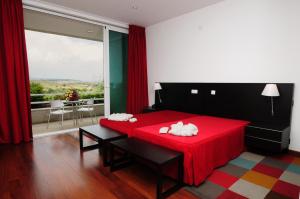 Uma cama ou camas num quarto em INATEL Vila Ruiva