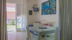 A television and/or entertainment centre at Residence Amarein