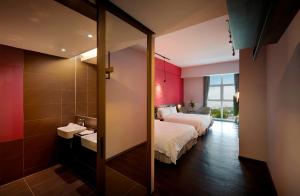Postel nebo postele na pokoji v ubytování KIP Hotel