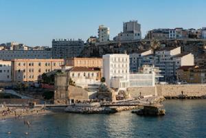 a view of a city with a bridge over the water at Les Bords De Mer in Marseille