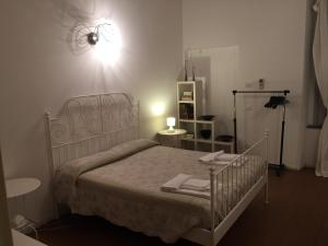 Кровать или кровати в номере Vip Bergamo Rooms