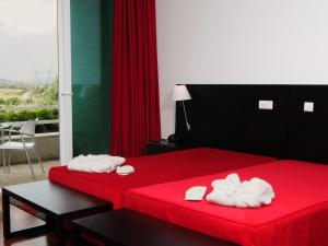 Uma cama ou camas num quarto em INATEL Vila Ruiva