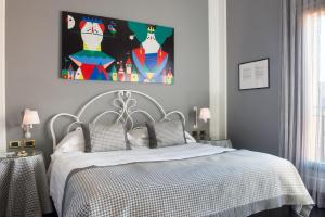 Postel nebo postele na pokoji v ubytování Art Hotel Orologio