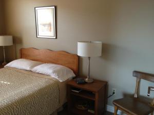 Cama o camas de una habitación en McIntyre's Cottages