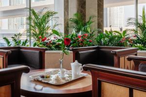 Uma área de estar em Stella Di Mare Dubai Marina Hotel