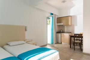 Kuchyň nebo kuchyňský kout v ubytování Ibiscus Hotel Malia
